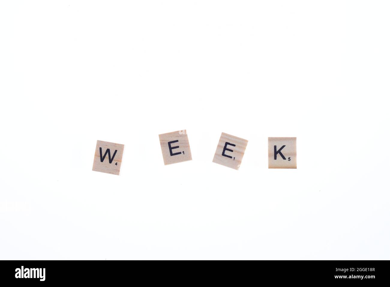 Word week arranged from wooden blocks on white background Stock Photo