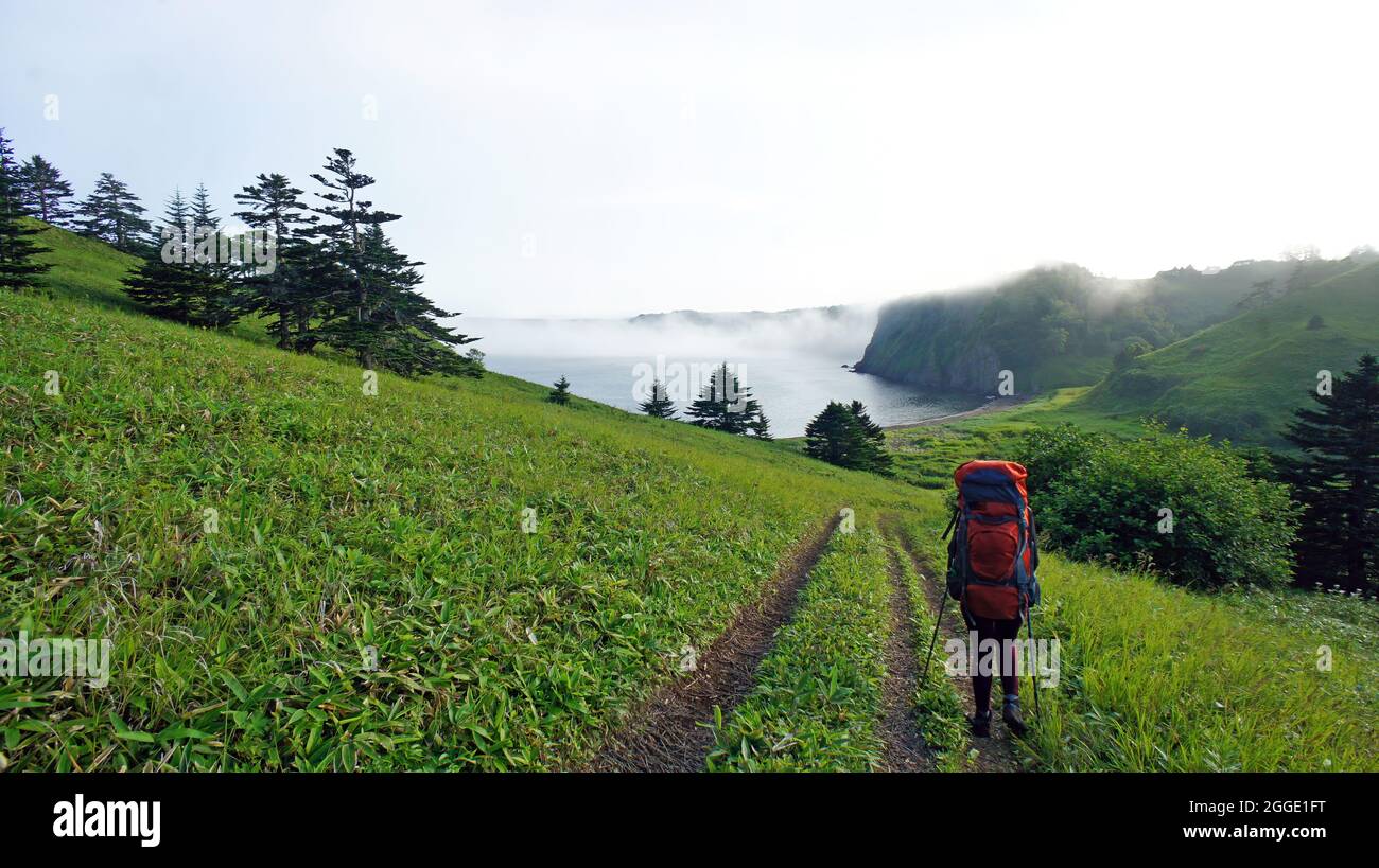 Green Cliffs and bay of Kuril islands. Shikotan. Stock Photo