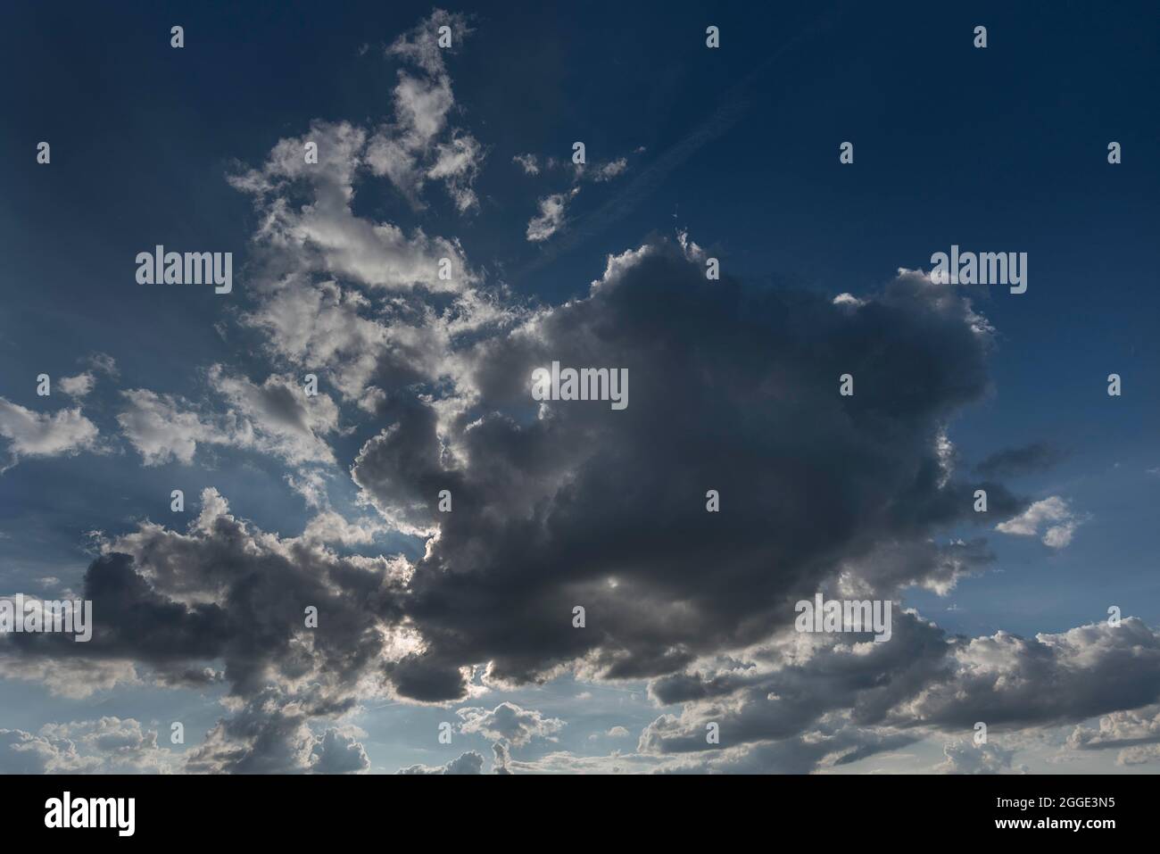 Sun behind a Nimbostratus cloud (Nimbostratus), Bavaria, Germany Stock Photo