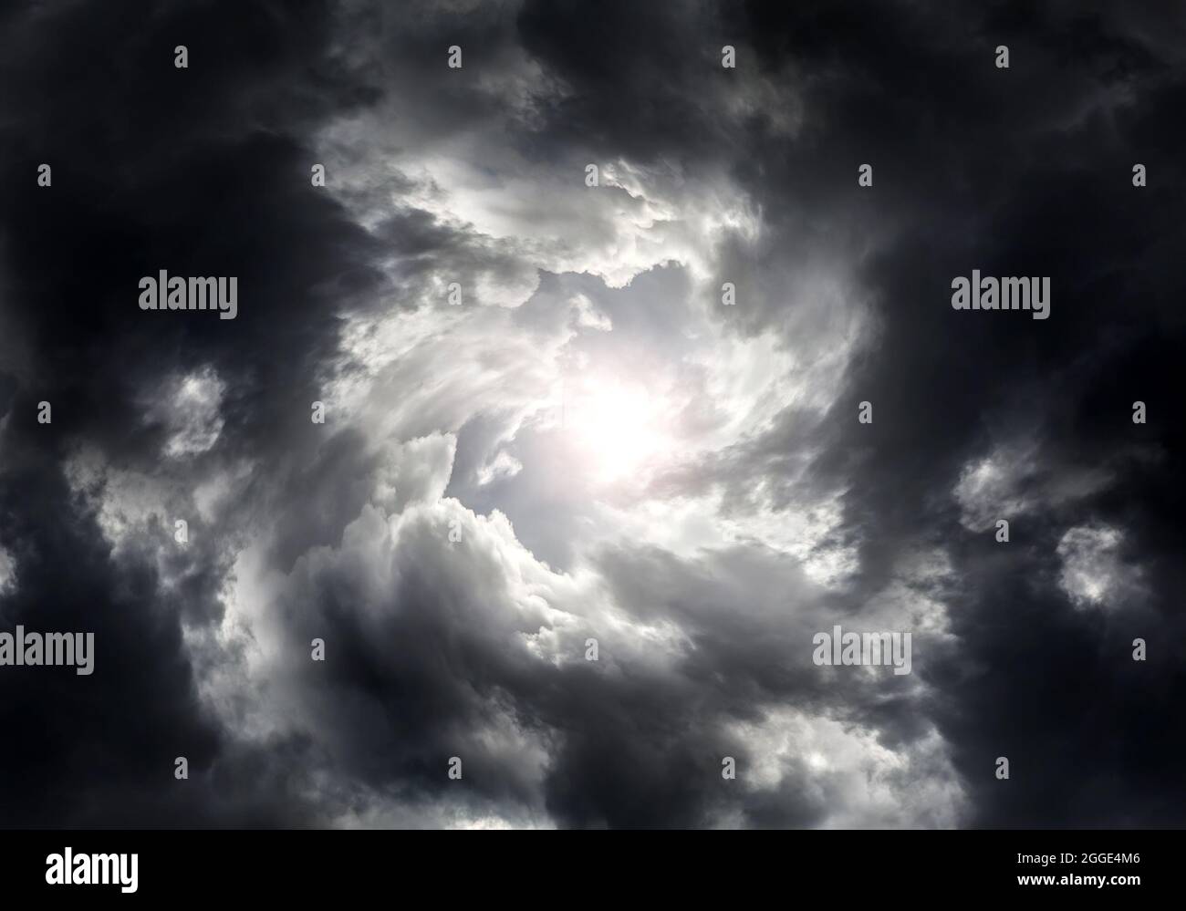 Light in the Dark and Dramatic Storm Clouds Stock Photo - Alamy