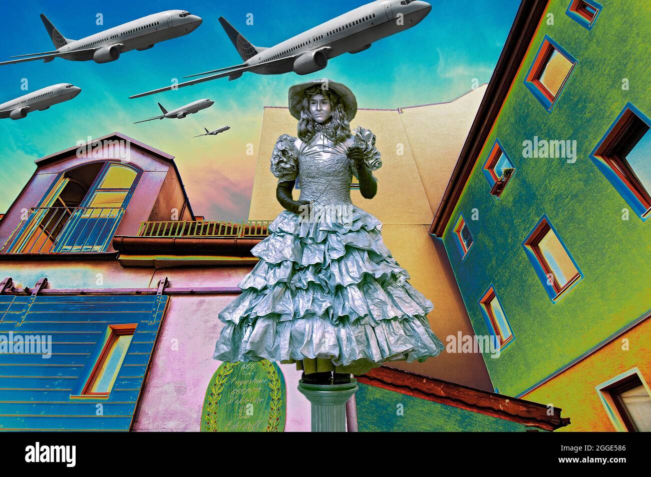 PHOTOMONTAGE, lady in silver and aeroplanes, backyard, Schwabing, Munich, Bavaria, Germany Stock Photo