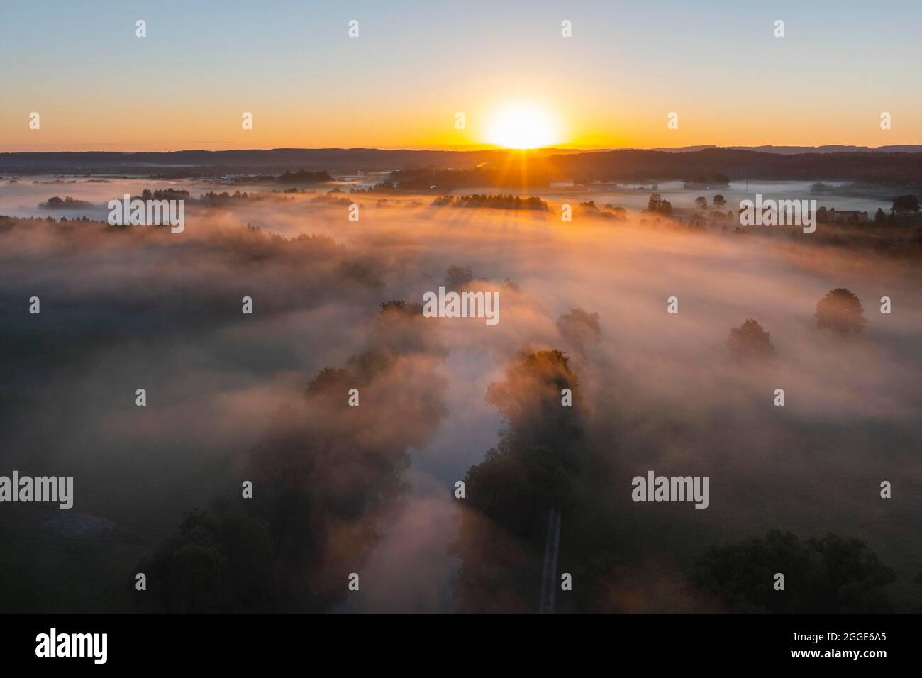 Clouds of fog over the Loisach River near Eurasburg, Toelzer Land, sunrise, drone shot, Alpine foothills, Upper Bavaria, Bavaria, Germany Stock Photo