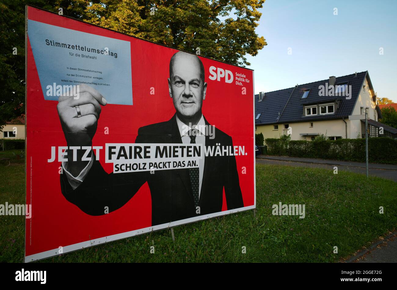 Election poster of the SPD, Olaf Scholz, German Minister of Finance and top candidate of the SPD, holding ballot envelope of the official postal Stock Photo