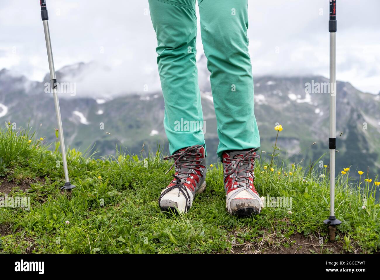 Detached shoe sole, broken hiking shoes provisionally repaired with