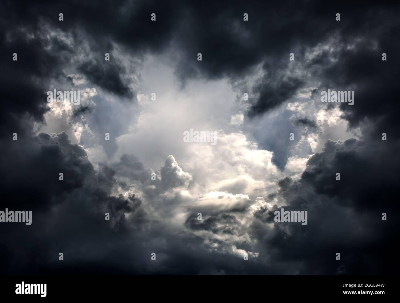 Light in the Dark and Dramatic Storm Clouds Stock Photo - Alamy
