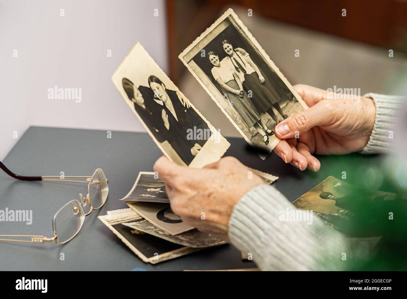 Looking at photo album hi-res stock photography and images - Alamy