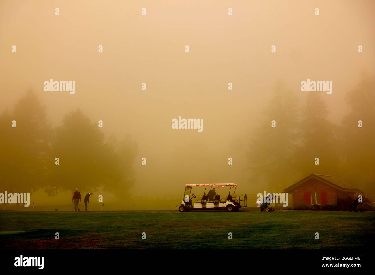 Crans Sur Sierre Golf Course with Fog in Crans Montana in Valais, Switzerland. Stock Photo