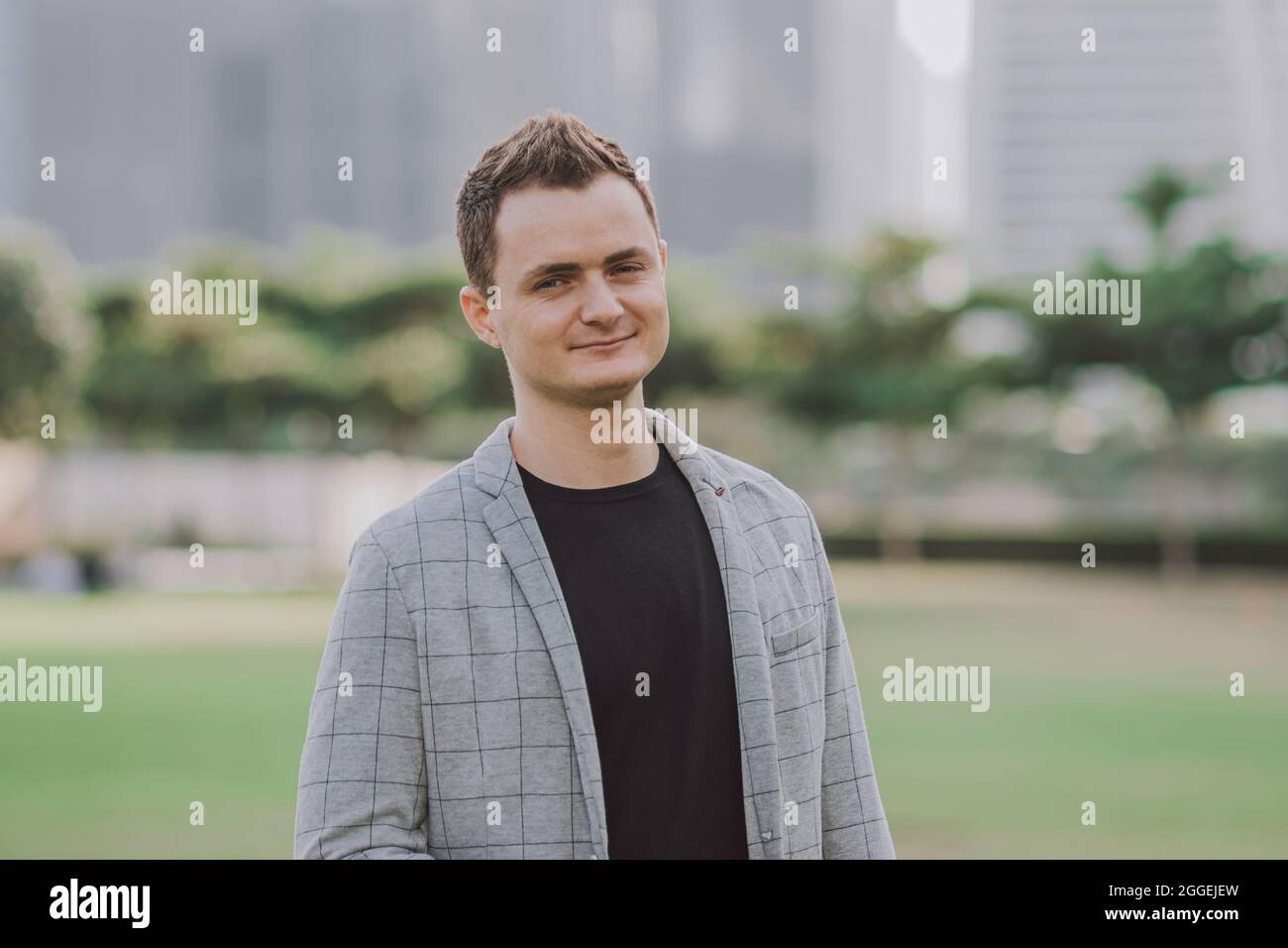 Portrait of a Adult Handsome Businessman in Suit Jacket with Blurred ...