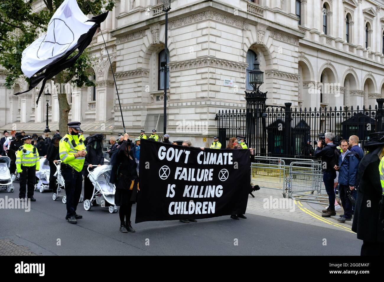 LONDON - 31ST AUGUST 2021: The Extinction Rebellion 'Pram Rebellion' march from Parliament Square and along Whitehall to Downing Street. Stock Photo