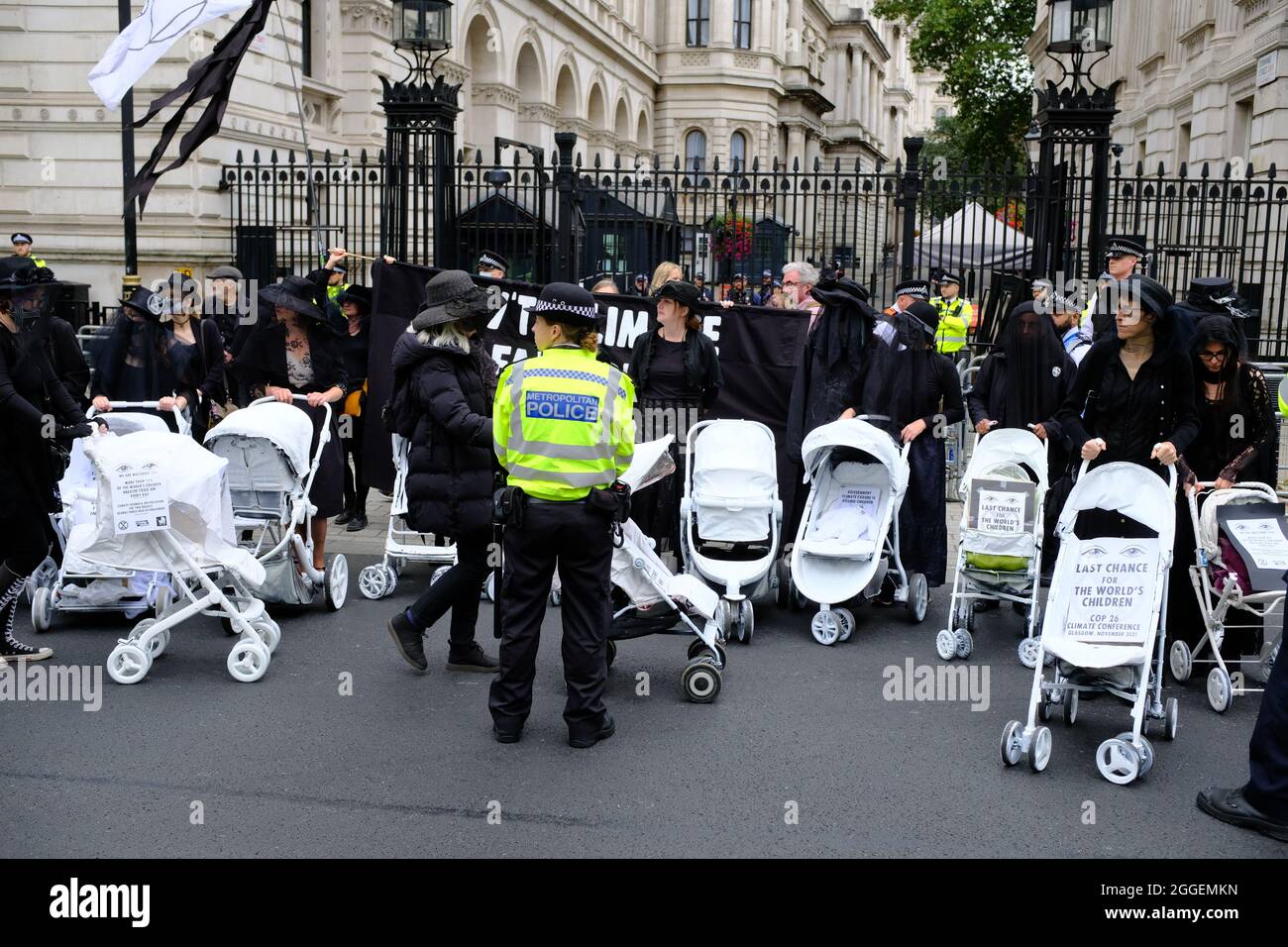 LONDON - 31ST AUGUST 2021: The Extinction Rebellion 'Pram Rebellion' march from Parliament Square and along Whitehall to Downing Street. Stock Photo