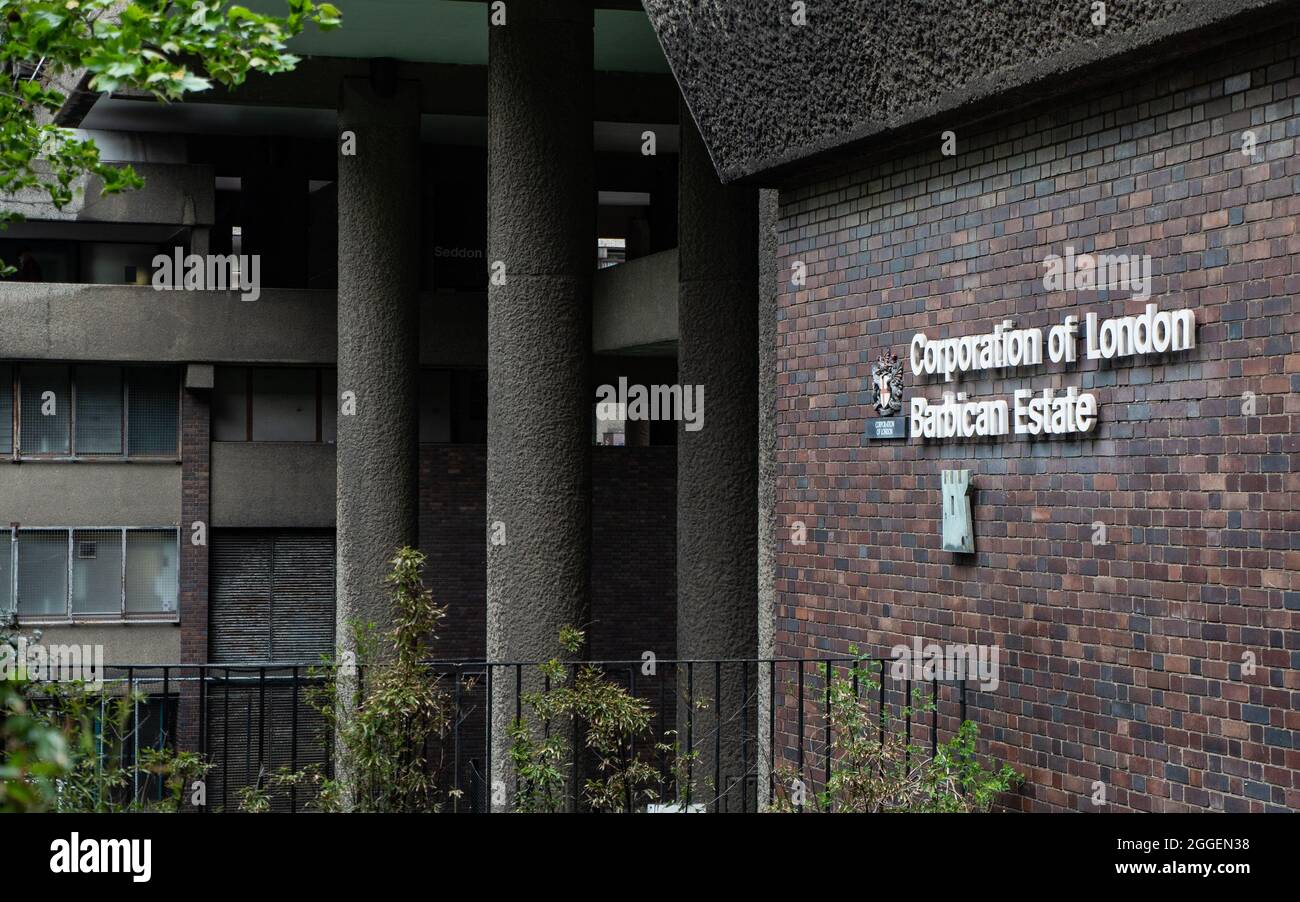 The Barbican Estate, London. Signage to the iconic brutalist architecture of the residential estate in the heart of the City of London. Stock Photo