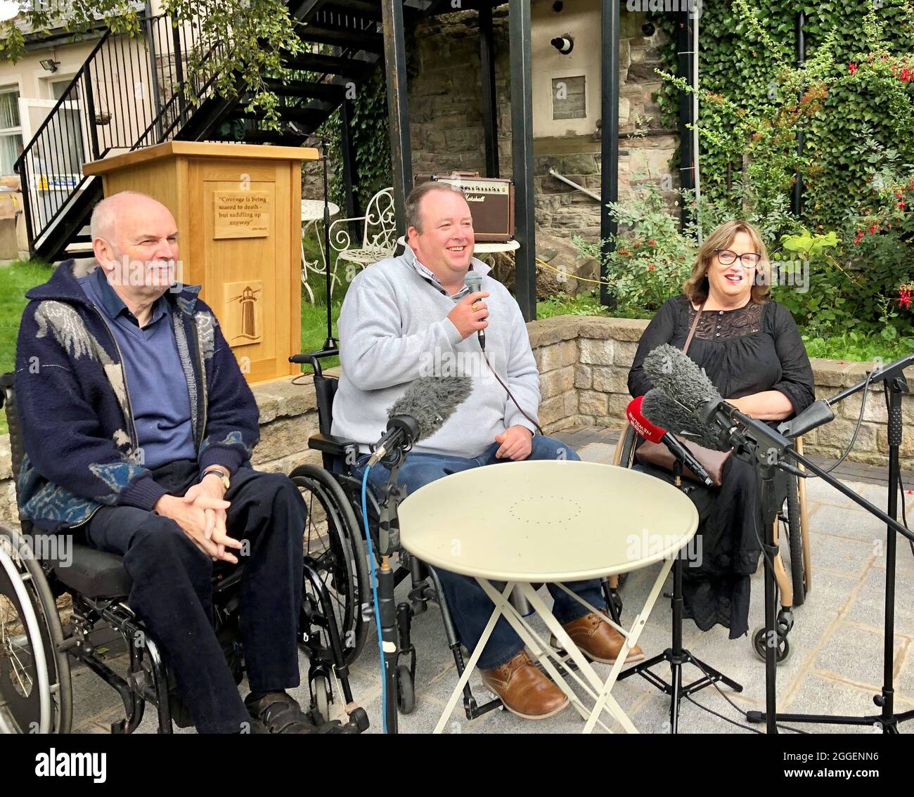 (Left to right) Peter Heathwood, Paul Gallagher, and Jennifer McNern at the Wave Trauma Centre in Belfast, Northern Ireland, following the opening of a payment scheme for those severely physically or psychologically injured during the Troubles. Picture date: Tuesday August 31, 2021. Stock Photo