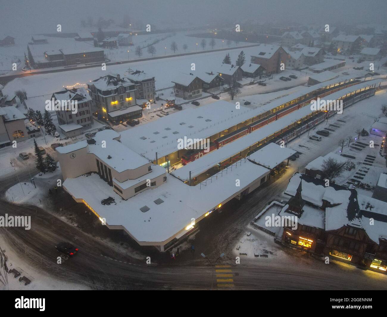 Drone night view at the train station of Engelberg on the Swiss alps Stock Photo