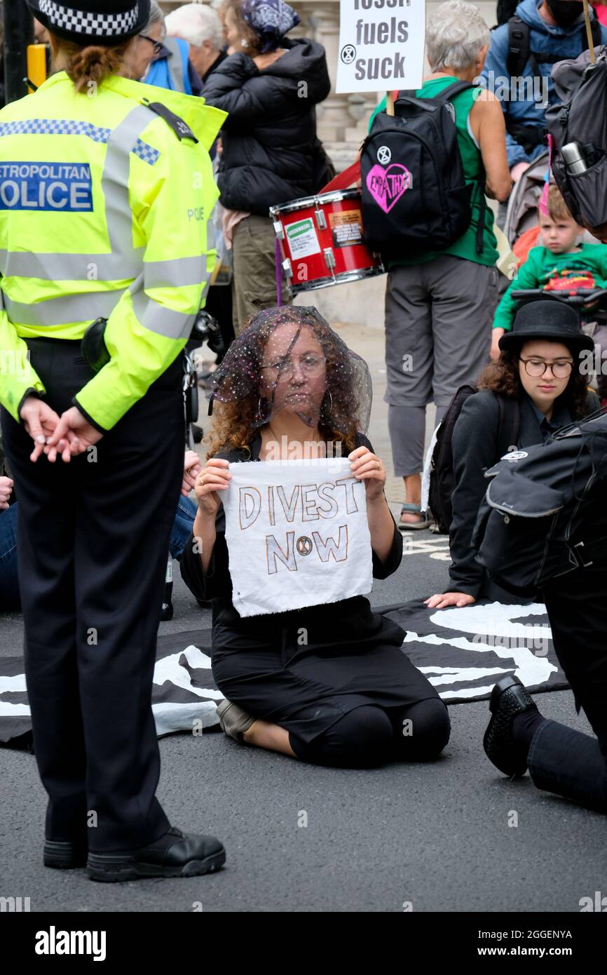 Whitehall, London, UK. 31st August 2021. Members of Extinction Rebellion stage Pram Rebellion Action, marching from Parliament to Trafalgar Square. Credit: Matthew Chattle/Alamy Live News Stock Photo