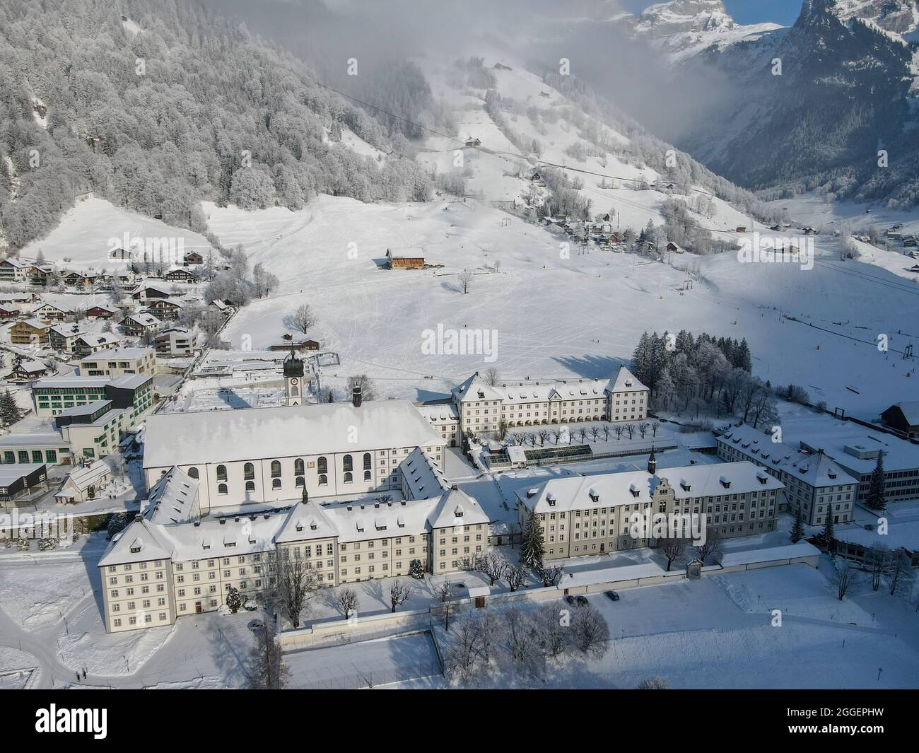 Winter landscape view at the monastery of Engelberg on the Swiss alps ...