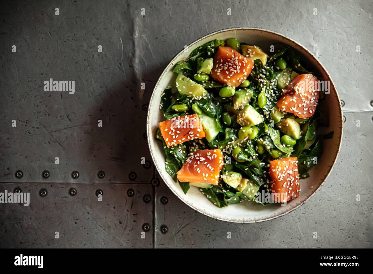 Healthy salmon bowl with avocado and edamame beans Stock Photo Alamy