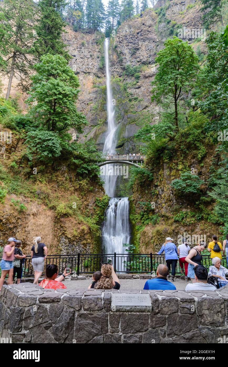 Tourists enjoy Multnomah Falls. Cascade Locks, Oregon, USA. Stock Photo