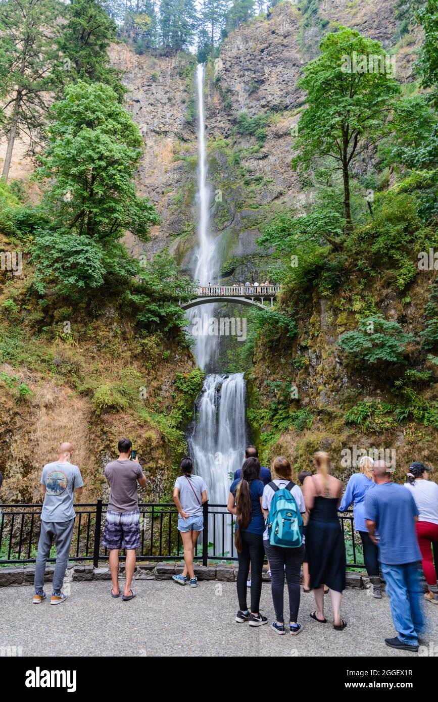 Tourists enjoy Multnomah Falls. Cascade Locks, Oregon, USA. Stock Photo