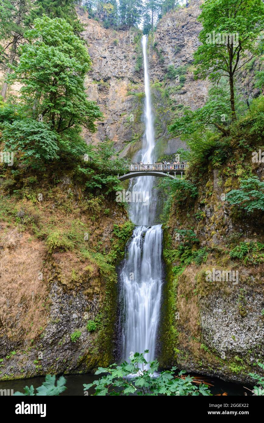 Tourists enjoy Multnomah Falls. Cascade Locks, Oregon, USA. Stock Photo