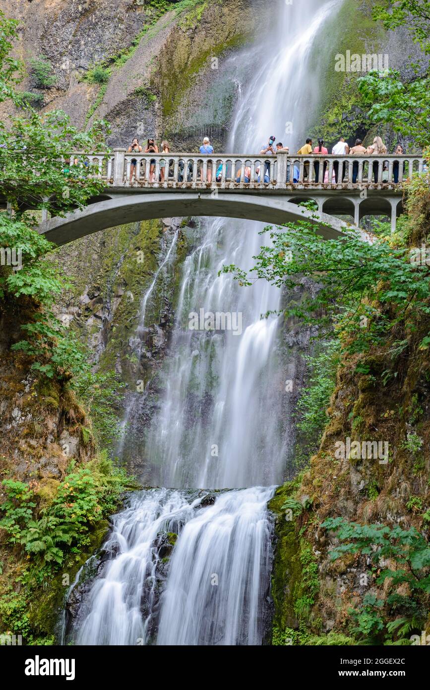 Tourists enjoy Multnomah Falls. Cascade Locks, Oregon, USA. Stock Photo