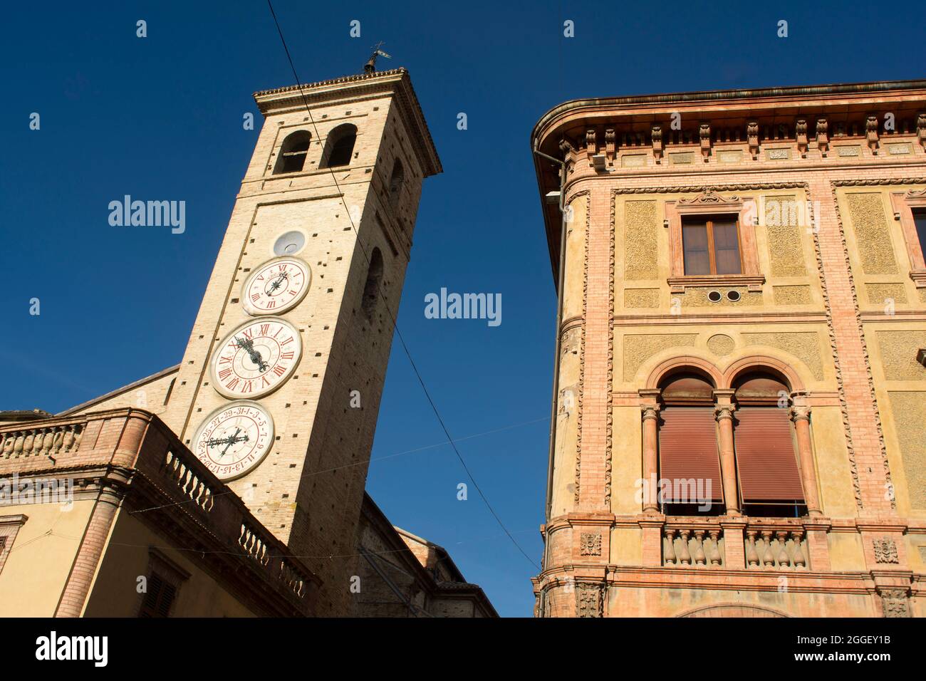 The church of San Francesco with the tower clocks in Tolentino Italy Stock Photo