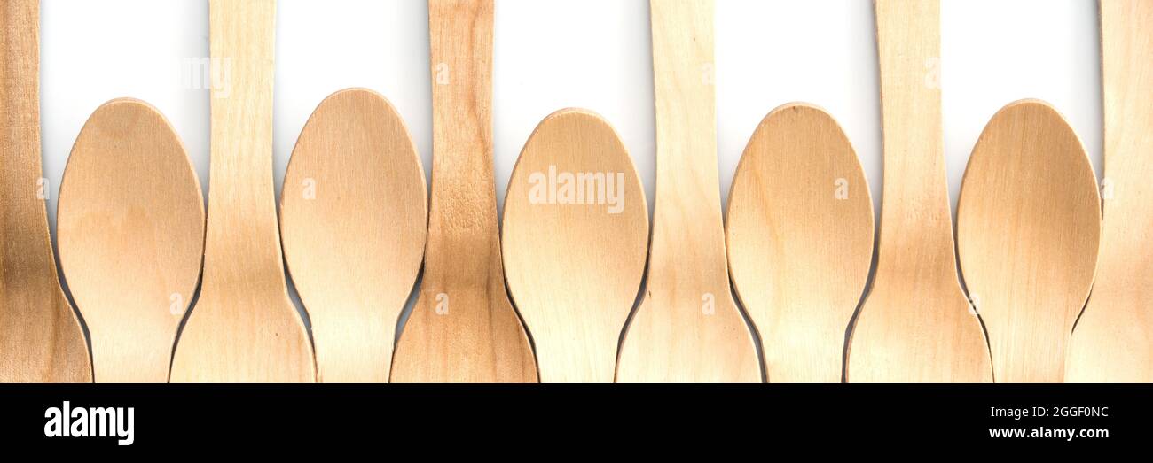 Wooden spoon composition on white background Stock Photo