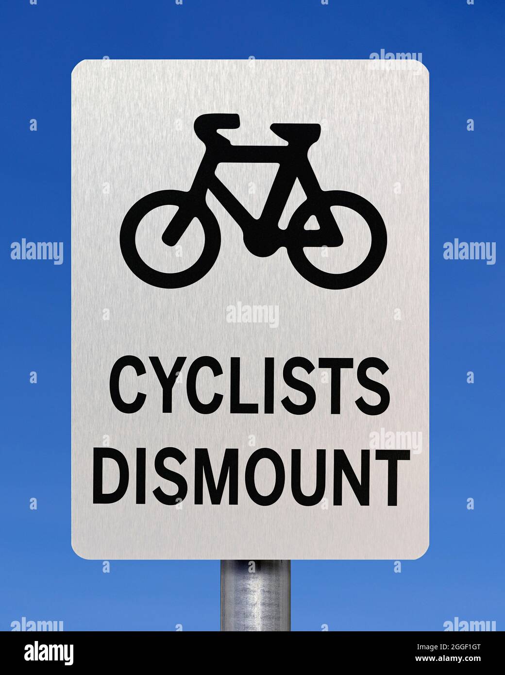 Cyclists Dismount Sign, United Kingdom Stock Photo