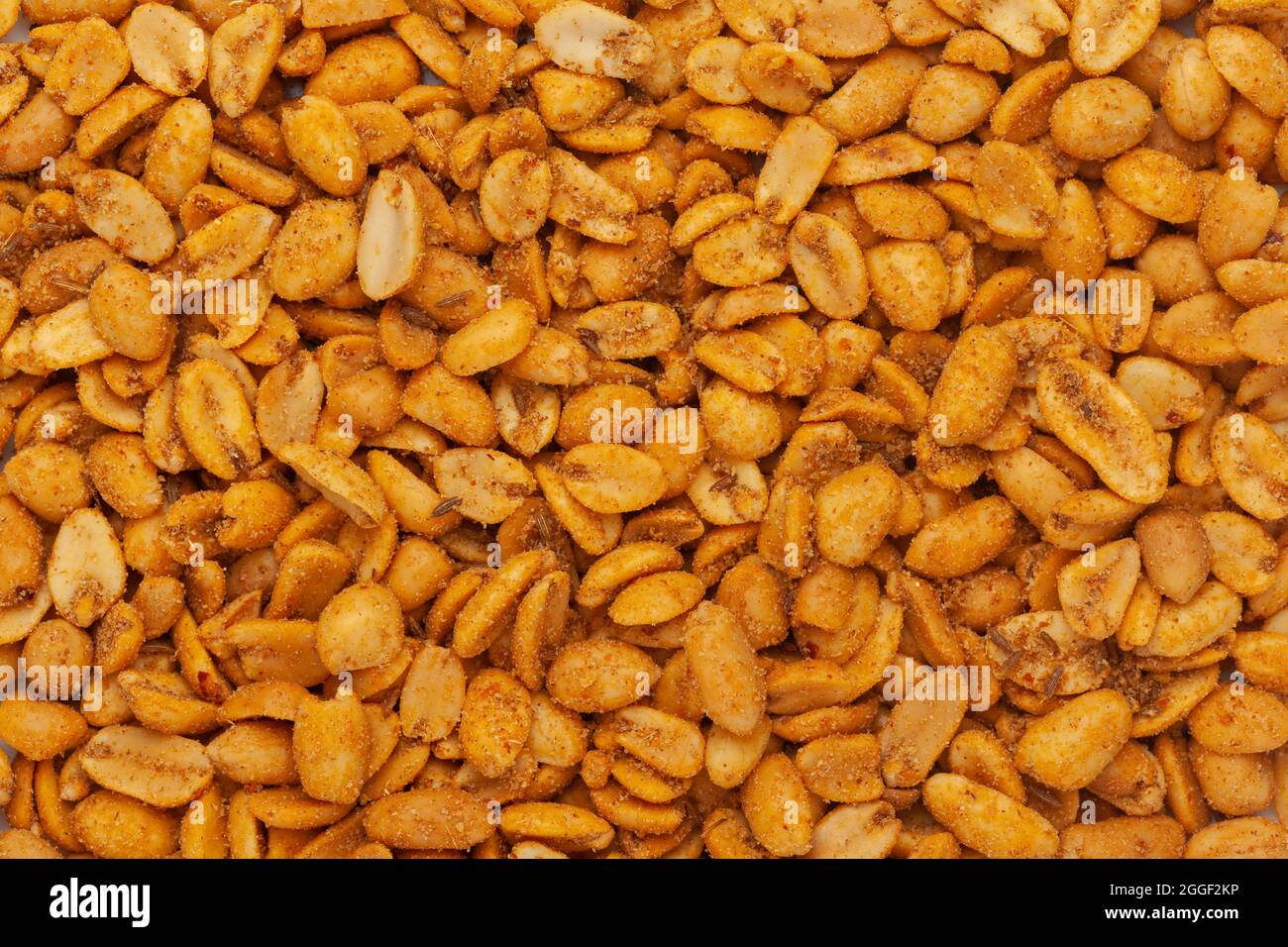 Close-up of Heeng jeera Peanuts mixture Indian namkeen (snacks) Full-Frame Background. Top View Stock Photo