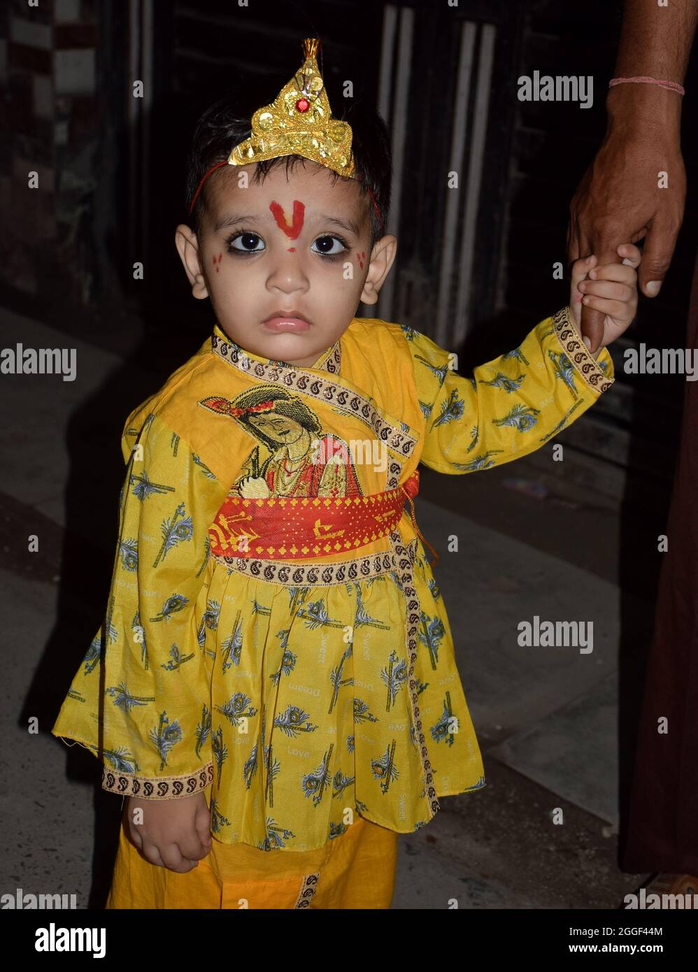 Indian child dressed as baby Krishna on occasion of Janmashtami ...