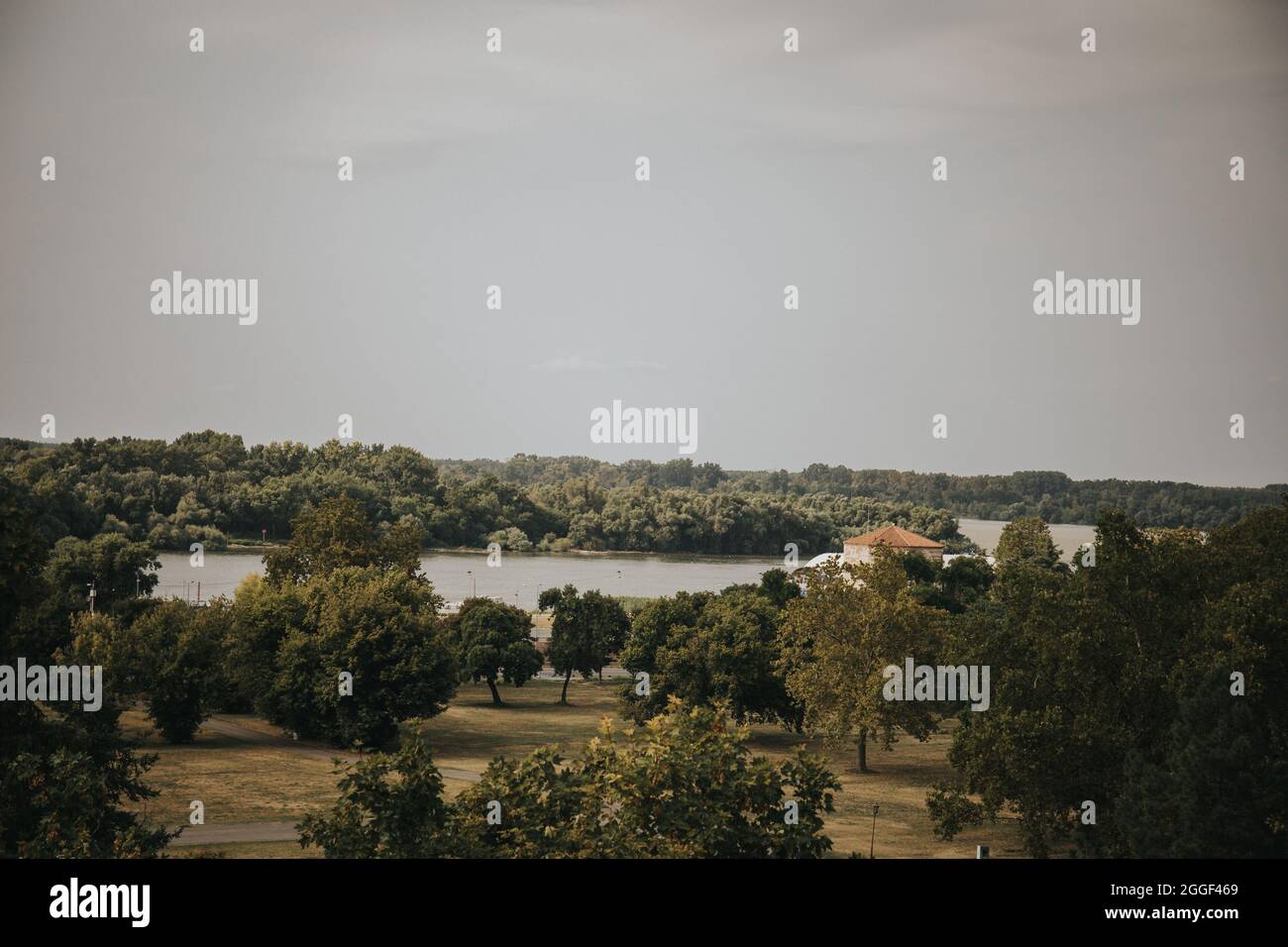 Mesmerizing view of a calm lake surrounded by trees Stock Photo - Alamy