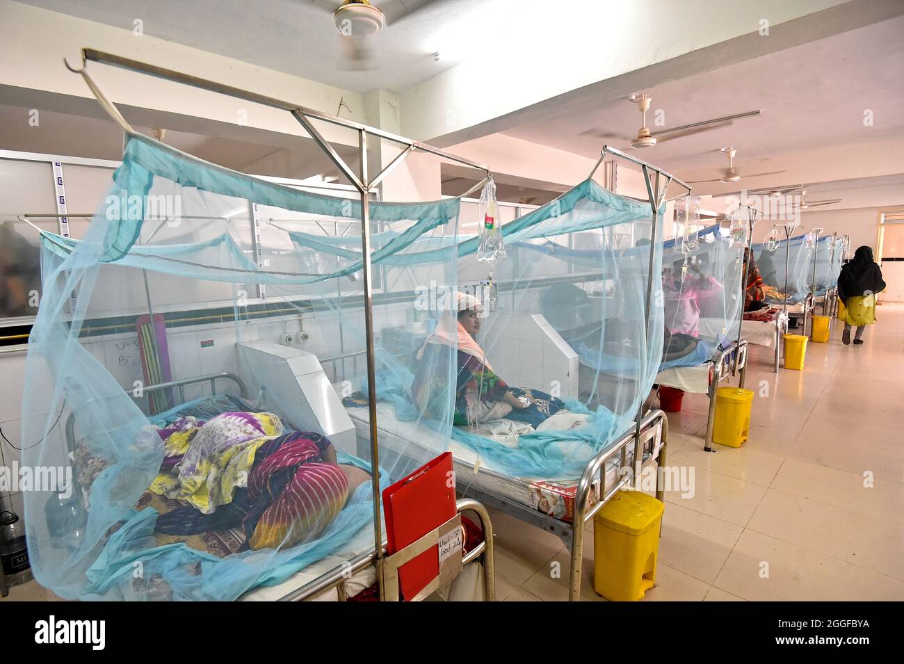 (210831) -- DHAKA, Aug. 31, 2021 (Xinhua) -- Dengue patients covered with mosquito nets receive treatment at a hospital in Dhaka, Bangladesh, Aug. 31, 2021. (Xinhua) Stock Photo