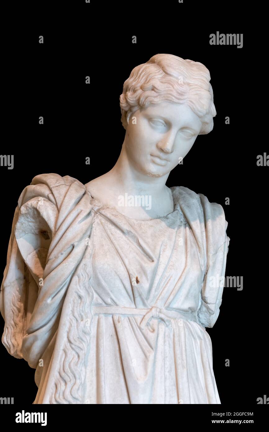 Close-up on ruins of ancient roman statue showing a short-haired woman Stock Photo