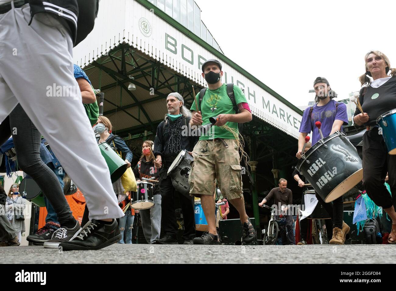 London, UK. 31st Aug 2021. Band of drummers begin their march Borough Market during Extinction RebellionÕs Stop The Harm protest on the ninth day of their Impossible Rebellion protests in London, United Kingdom on August 31, 2021. Kieran Riley/Pathos Credit: One Up Top Editorial Images/Alamy Live News Stock Photo