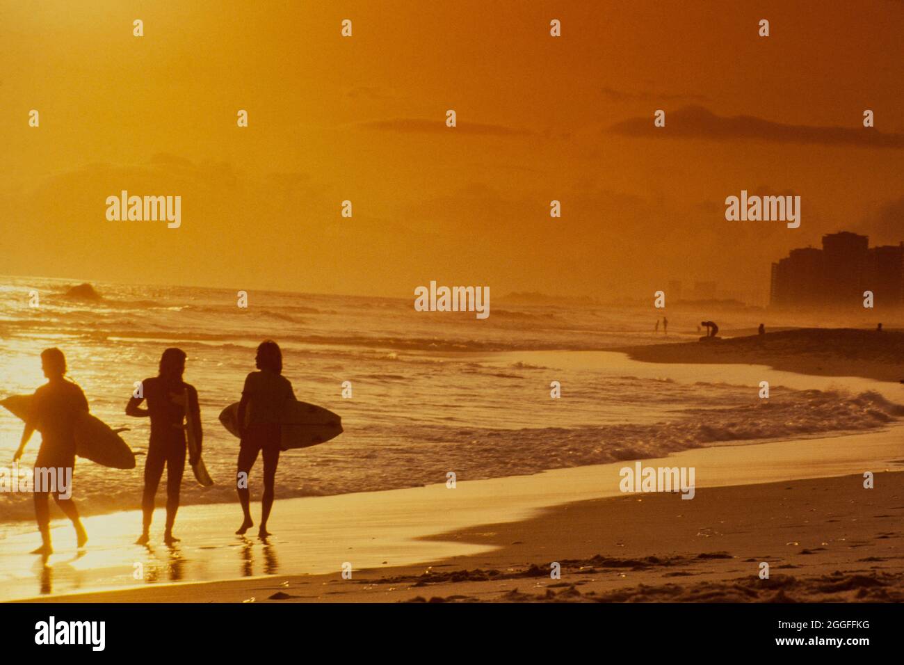 Surfers at Barra da Tijuca beach, Rio de Janeiro lifestyle. Stock Photo