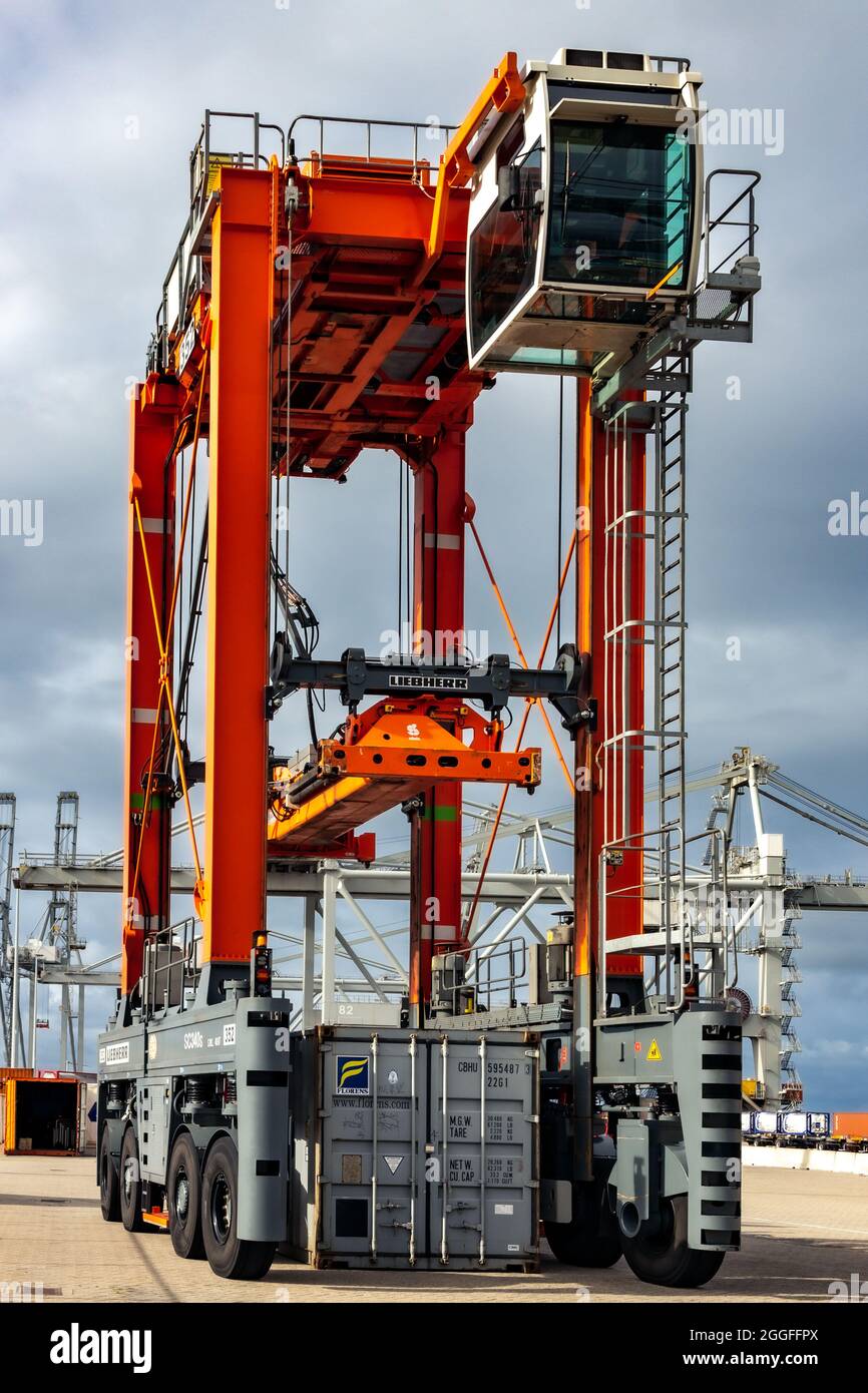 Straddle carrier used for moving containers in a container terminal. Port of Rotterdam, Netherlands. September 6, 2015 Stock Photo