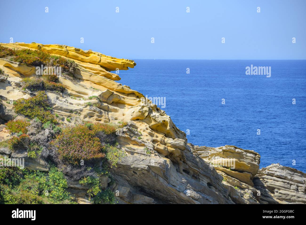 Estribela Rocks Colourful sandstone rock formations on the Cantabrian coastline. Mount ...