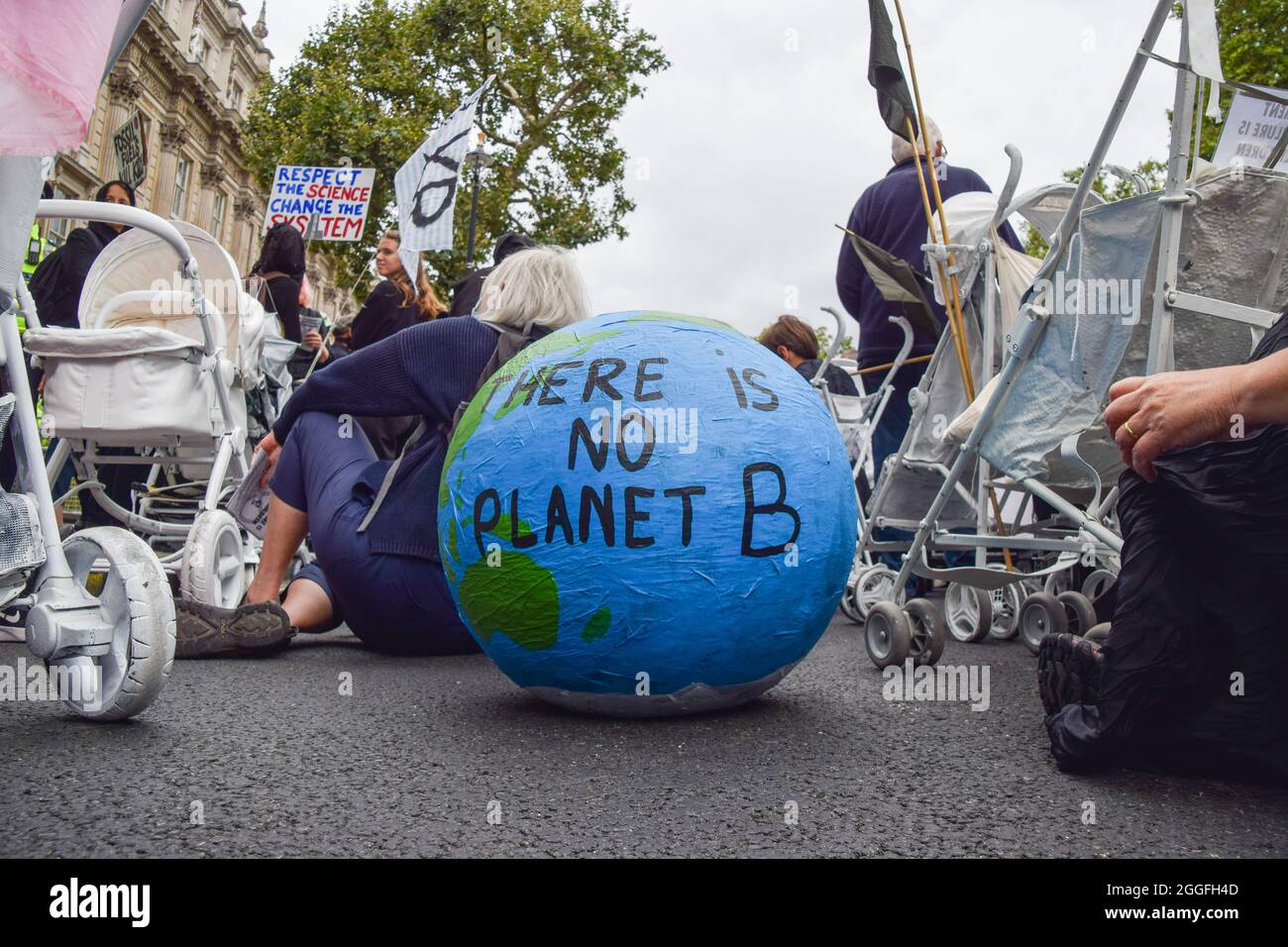 London, United Kingdom. 31st August 2021. Protesters outside Downing Street. Extinction Rebellion protesters dressed in black marched with prams in Westminster as part of their two-week Impossible Rebellion campaign. (Credit: Vuk Valcic / Alamy Live News) Stock Photo