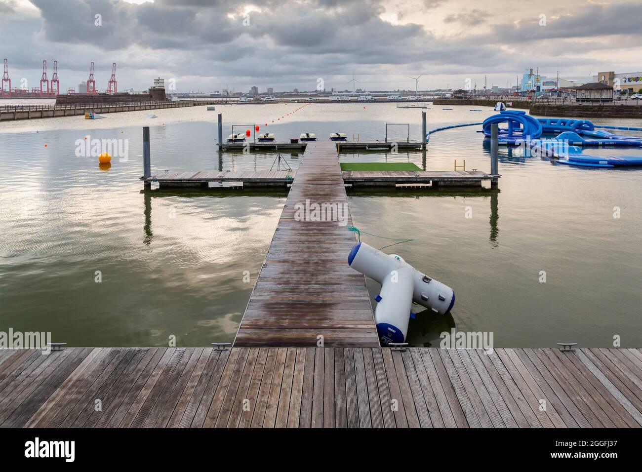 New Brighton, Wirral, UK: Wild Shore Aqua Park, sup self launch dock and obstacle course on the marine lake Stock Photo