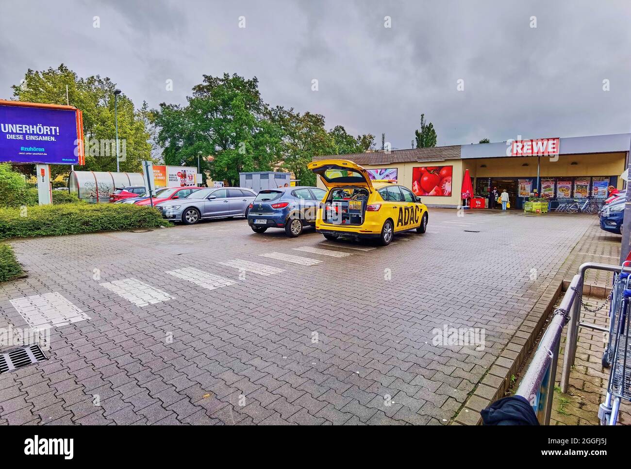 Berlin, Germany - August 30, 2021: Emergency vehicle of the automobile club ADAC in a supermarket parking lot. Stock Photo