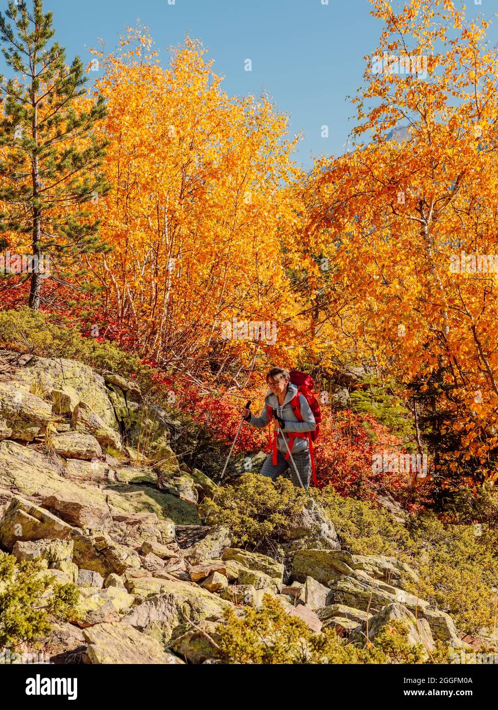 Hiker woman in rocky valley hi-res stock photography and images - Alamy
