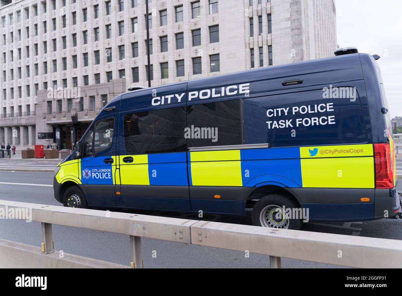 London, UK. 31sth August 2021. London Bridge reopend for traffic  in both directions after an afternoon's block-off by  Extinction Rebellion XR protesting for climate change at south side of London Bridge near Borough Market.  City Police Task Force van Credit: Xiu Bao/Alamy Live News Stock Photo