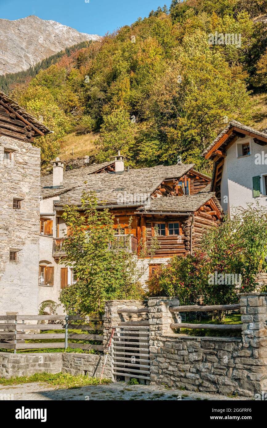Traditional houses in the mountain village Soglio, Ticino, Switzerland, in autumn. Stock Photo