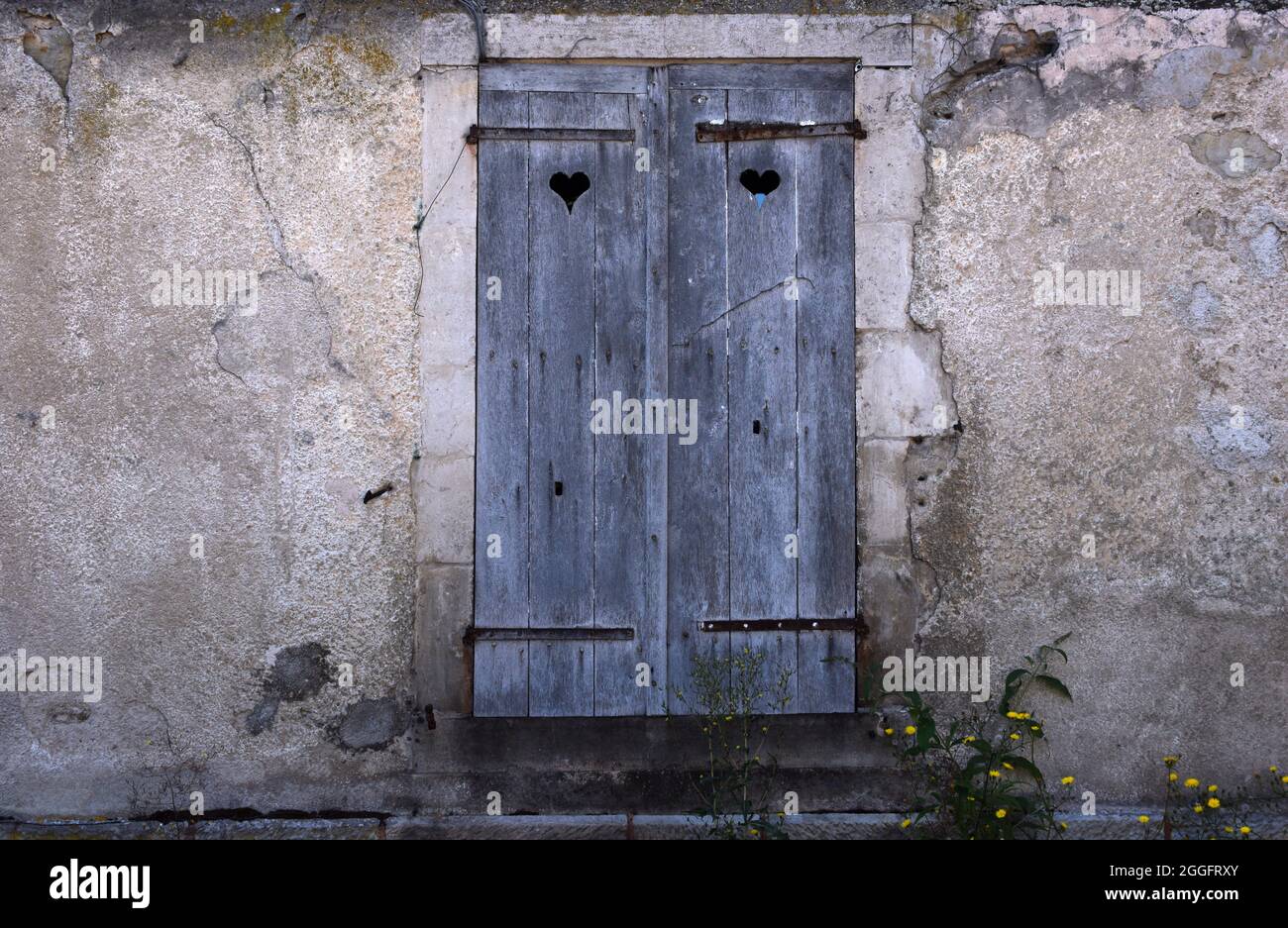 Old shutters on a building in Bar-sur-Seine, France Stock Photo
