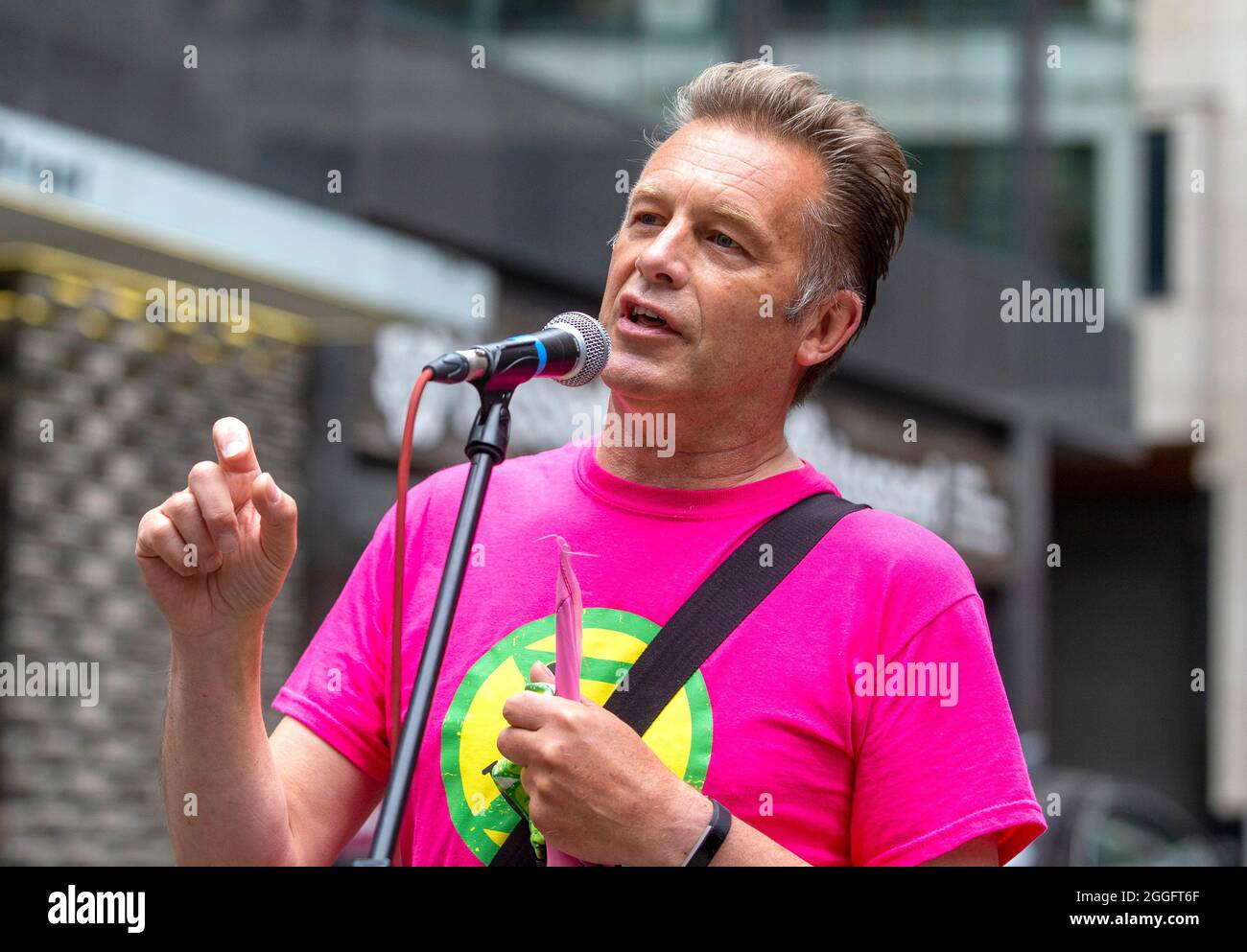 London, UK. 30th Aug, 2021. London, UK 30 8 21 Naturalist and environmentalist, Chris Packham, addresses the demonstration. Members of Extinction Rebellion march from The Shard to Tower Bridge where supporters climb on top of a caravan and block the road. Extinction Rebellion Credit: Mark Thomas/Alamy Live News Stock Photo