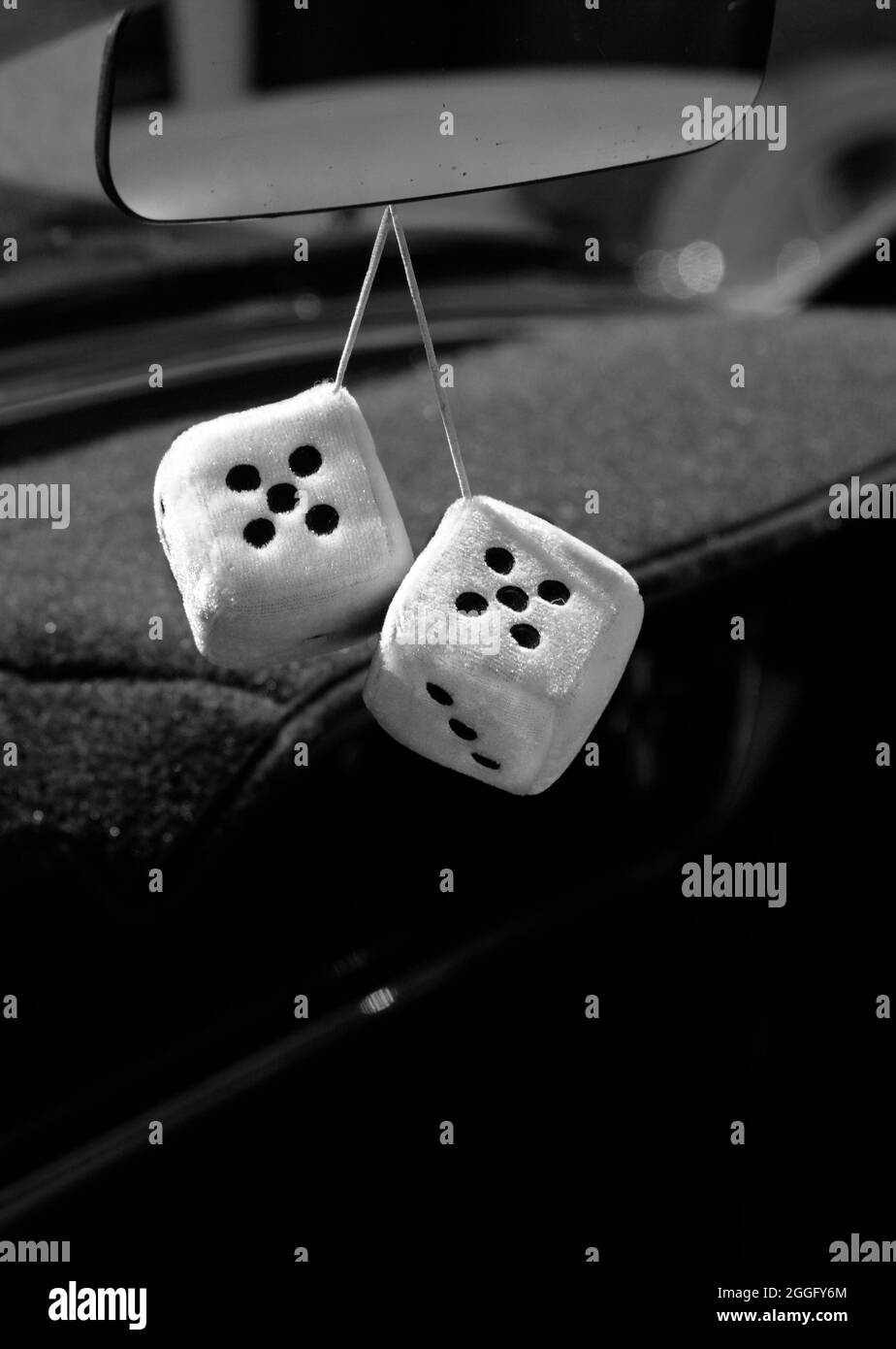 Car fuzzy dice Black and White Stock Photos & Images Alamy
