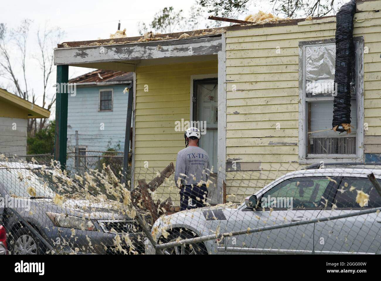 Houma, United States Of America. 30th Aug, 2021. Houma, United States of America. 30 August, 2021. FEMA Texas Task Force 1 first responders check homes for survivors during preliminary damage assessments in the aftermath of Hurricane Ida August 30, 2021 in Houma, Louisiana. Ida swept through the area with winds of 150 mph and made landfall 16-years ago to the day of Hurricane Katrina. Credit: Julie Joseph/FEMA/Alamy Live News Stock Photo