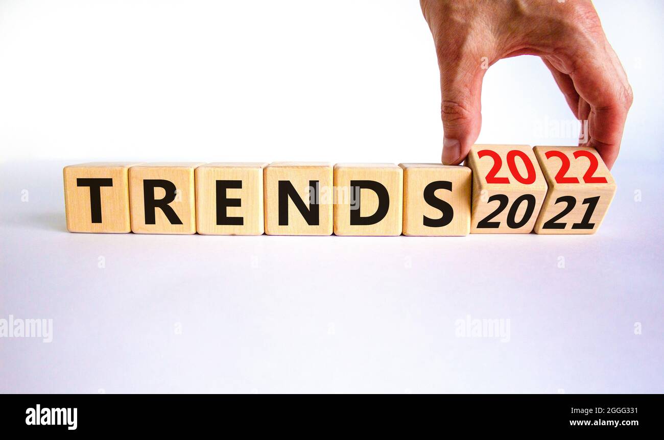 2022 Trends New Year Symbol Businessman Turns Wooden Cubes And Changes Words Trends 2021 To Trends 2022 Beautiful White Background Copy Space Stock Photo Alamy New Year 2022 Trends