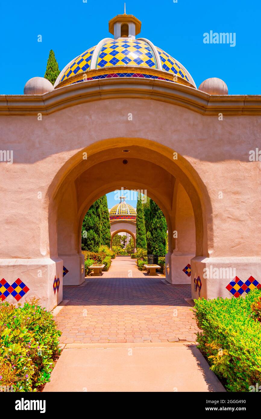 A quiet park with several tiled decorated pavilions sits in  historic Balboa Park, in San Diego, California.  The brilliant colors of the tile adds to Stock Photo