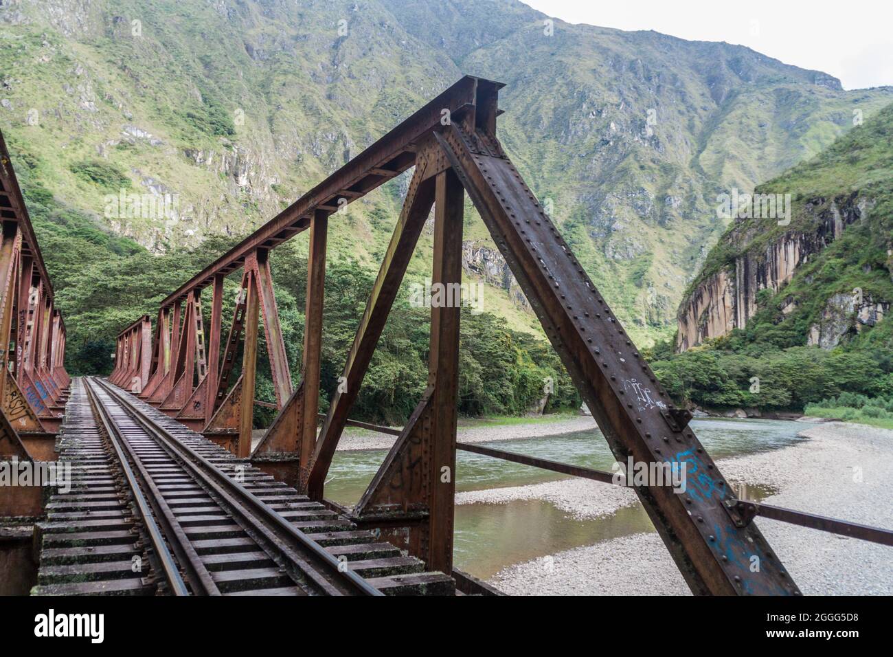 Railway bridge in Urubamba river valley near Aguas Calientes village, Peru Stock Photo