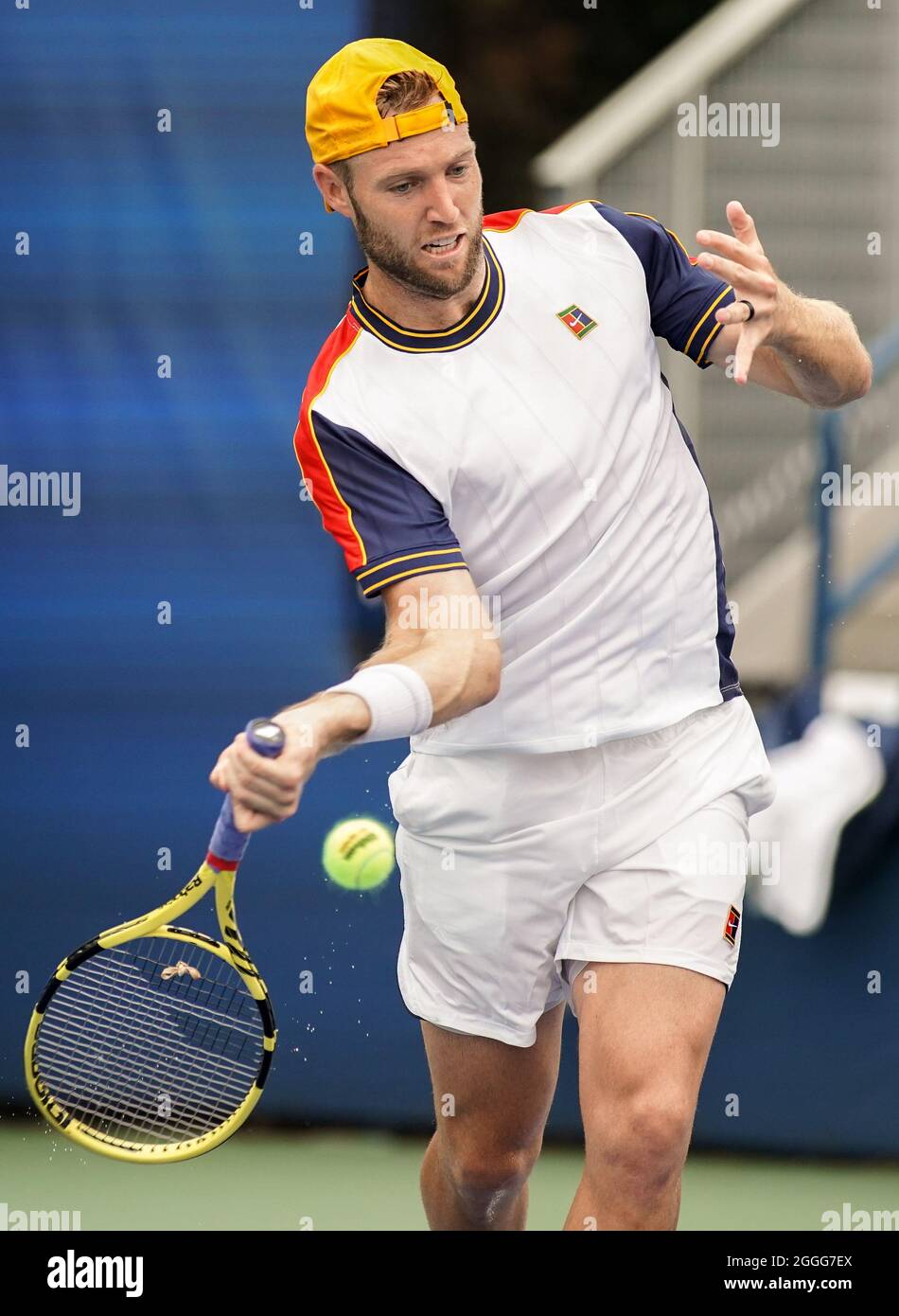 New York, United States. 31st Aug, 2021. Jack Sock of the USA hits a  forehand to Yoshihito Nishioka of Japan in the second set of their first  round match held on Court